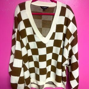 2XL brown and white checkered sweater.